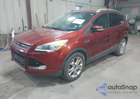 2014 Ford Escape Titanium z USA, uszkodzony, nr VIN 1FMCU9J97EUE55734